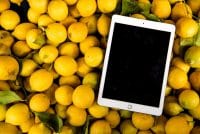 photo of ipad on pile of lemons