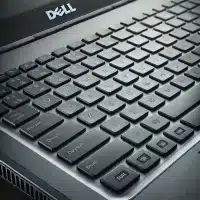 A high-resolution, close-up image of a Dell laptop keyboard.