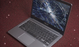 A premium replacement 144Hz IPS or 2.8K OLED display panel for an Asus laptop, positioned on a solid light pink background for Atlantis repair services.