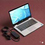 Close-up of a high-quality replacement internal DC power jack with a reinforced charging port and cable for a Dell laptop, positioned on a solid light pink background for Atlantis repair services.