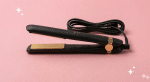 A premium replacement 3-pin UK power cable and swivel cord connector for GHD hair straighteners, displayed on a solid light pink background for Atlantis repair services.