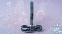 A professional GHD circuit board repair and replacement ceramic heating element, displayed on a solid light pink background for Atlantis UK-wide hair straightener repair services.