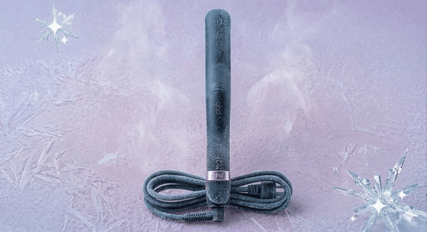 A professional GHD circuit board repair and replacement ceramic heating element, displayed on a solid light pink background for Atlantis UK-wide hair straightener repair services.