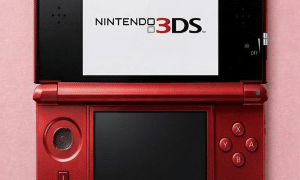 A brand new replacement circle pad analogue stick and rubberised thumb grip for a Nintendo 3DS XL, shown on a solid light pink background for Atlantis console repair services.