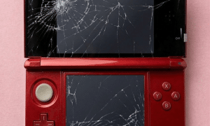 A premium replacement top LCD Retina-standard display and bottom touch screen panel for a Nintendo 3DS XL, displayed on a solid light pink background for Atlantis console repair services.