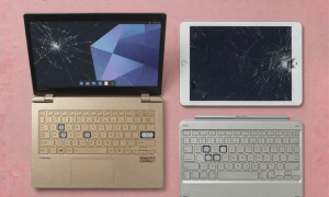 A professional technician repairing a tablet screen in our Canterbury workshop, displayed on a solid light pink background for Atlantis UK-wide mail-in services.