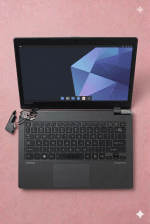 A replacement heavy-duty steel hinge and reinforced plastic lid mounting bracket for a Toshiba Satellite, displayed on a solid light pink background for Atlantis UK-wide repair services.