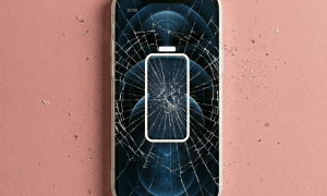 Close-up of a high-quality replacement Super Retina XDR OLED display assembly for the Apple iPhone 12 Pro, positioned on a solid light pink background for Atlantis repair services.