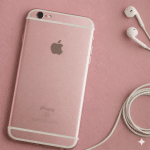 Close-up of the rear aluminium unibody and frame of an Apple iPhone 6 and 6S series handset, set against a solid light pink background for Atlantis repair services.