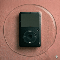 Close-up of a disassembled Apple iPod Classic logic board showing precision cleaning of the 30-pin dock connector and internal circuitry, positioned on a solid light pink background for Atlantis repair services.