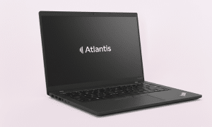 Professional Lenovo ThinkPad laptop on a clean white background featuring the Atlantis brand logo on the screen, representing high-quality repair standard