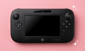A replacement Wii U GamePad LCD screen and matching touch digitiser panel, displayed on a solid light pink background for Atlantis professional repair services.