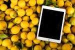 photo of ipad on pile of lemons